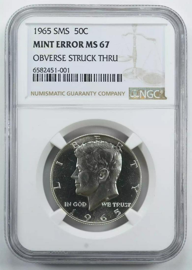 1965 SMS KENNEDY HALF DOLLAR 50C NGC MS 67 UNC - ERROR OBV STRUCK THRU (001): 1965 SMS KENNEDY HALF DOLLAR 50C NGC MS 67 UNC - ERROR OBV STRUCK THRU (001) Certification: NGC Composition: Silver Grade: MS-67 Year: 1965 Circulated/Uncirculated: Uncirculated Strike Type: MS Mint L