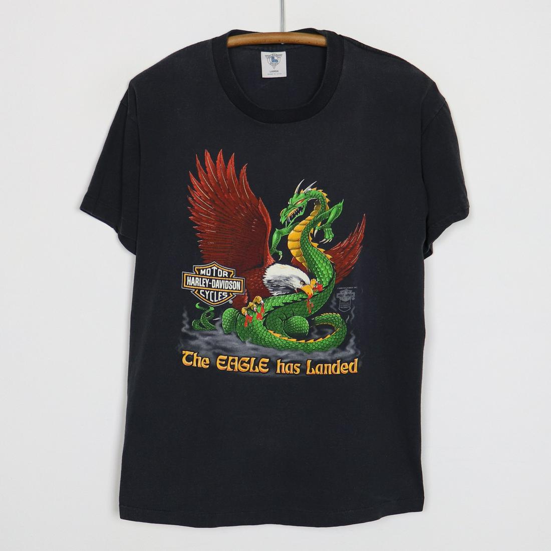 1990s Harley Davidson The Eagle Has Landed Shirt: 1990s Harley Davidson The Eagle Has Landed Shirt Original 1990s Harley Davidson The Eagle Has Landed Shirt. This is a true vintage shirt not a modern reproduction. Sizes vary so please use measurement