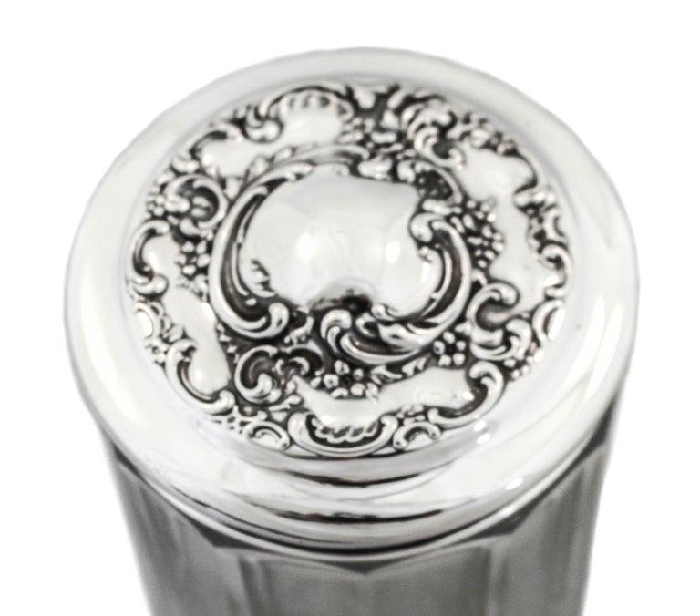 Sterling and Crystal Vanity Jar: Sterling and Crystal Vanity Jar Creator:: Wallace Silversmiths (Manufacturer) Dimensions:: Height: 5 in (12.7 cm) Dimensions:: Diameter: 4 in (10.16 cm) Materials and Techniques:: Crystal Materials an