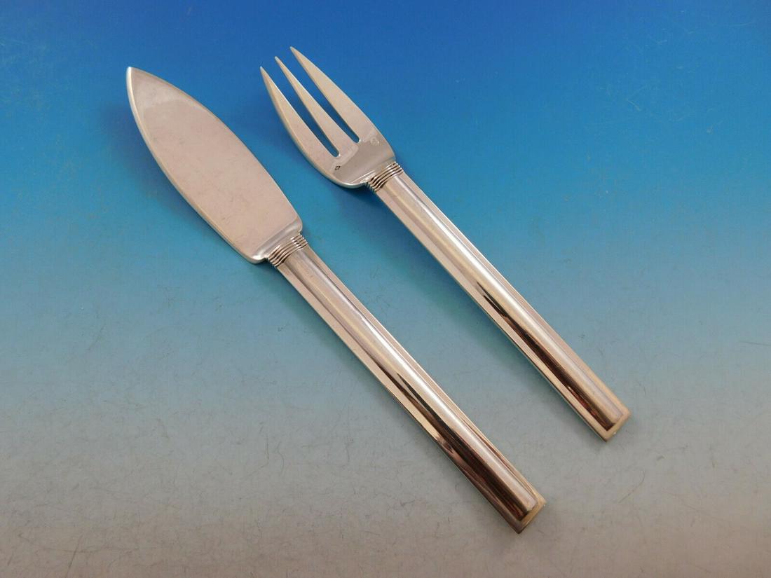 Cannes by Puiforcat France Sterling Silver Flatware Individual Fish Set 2-pc: Cannes by Puiforcat France Sterling Silver Flatware Individual Fish Set 2-pc Jean puiforcat was a french silversmith, sculptor and designer. Puiforcat is considered the "most important french art deco