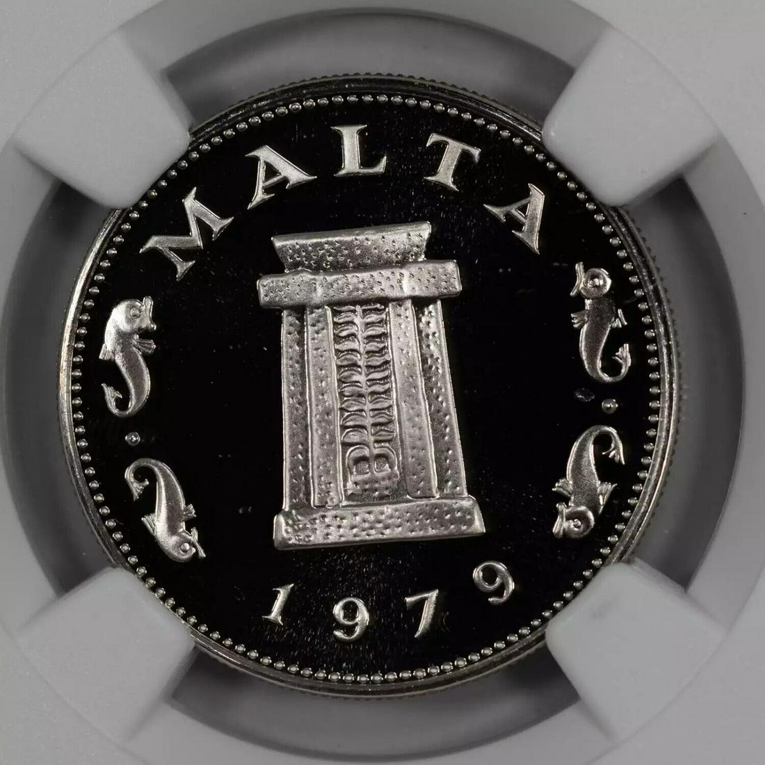 1979 FM PROOF MALTA HAGAR QIM TEMPLE RITUAL ALTAR 5C NGC PF 69 ULTRA CAMEO (016): 1979 FM PROOF MALTA HAGAR QIM TEMPLE RITUAL ALTAR 5C NGC PF 69 ULTRA CAMEO (016) Certification: NGC Composition: Nickel-Brass Grade: PF-69 Year: 1979 Circulated/Uncirculated: Uncirculated Strike Type: