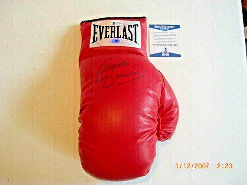 ANGELO DUNDEE HOF TRAINER FOR ALI BECKETT/COA SIGNED BOXING GLOVE: ANGELO DUNDEE HOF TRAINER FOR ALI BECKETT/COA SIGNED BOXING GLOVE Product: Glove Sport: Boxing Original/Reprint: Original Pre-Owned PLEASE NOTE: Framed Large or heavy Items do not have shipping costs 