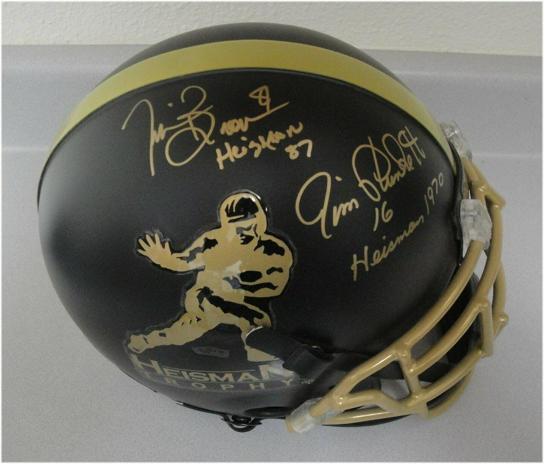 Tim Brown Jim Plunkett Dual Hand Signed Auto Heisman Helmet W/: Tim Brown Jim Plunkett Dual Hand Signed Auto Heisman Helmet W/ Sport: Football-NFL Product: Helmet Original/Reprint: Original Player: Tim Brown Jim Plunkett Team: Oaklnad Raiders Autograph Authenticat