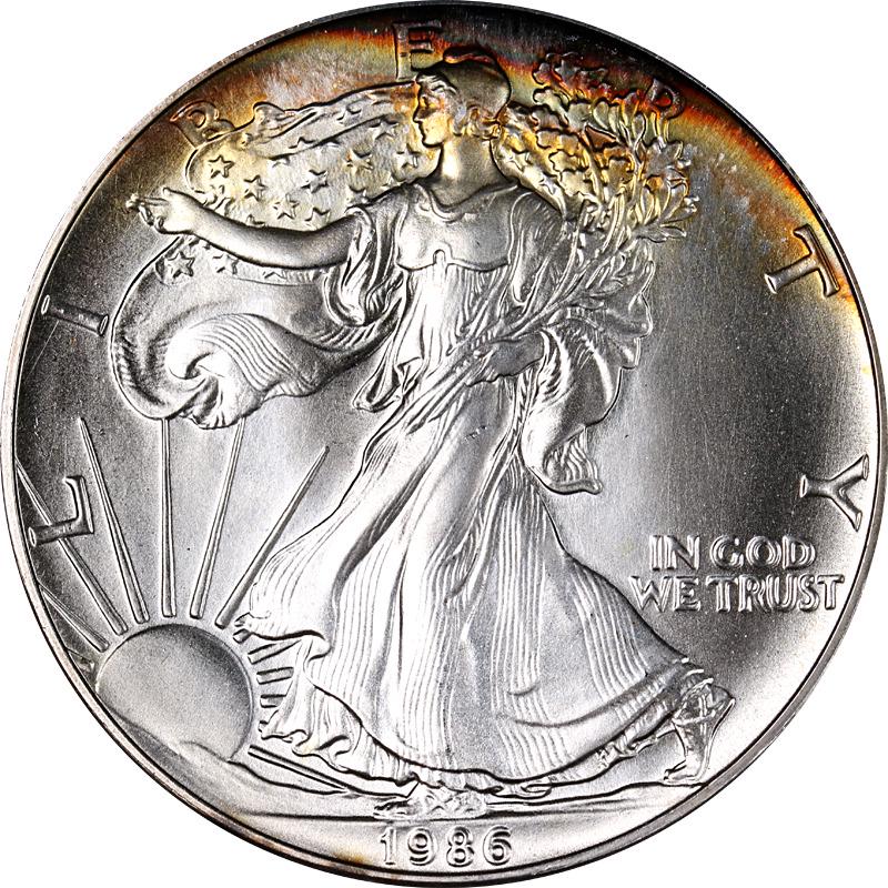 1986 Silver American Eagle $1 - Neat Toning: 1986 Silver American Eagle $1 - Neat Toning Certification: Uncertified Composition: Silver Year: 1986 Pre-Owned The MYNT Guarantee: All items in this auction are guaranteed to be 100% authentic. At Yo