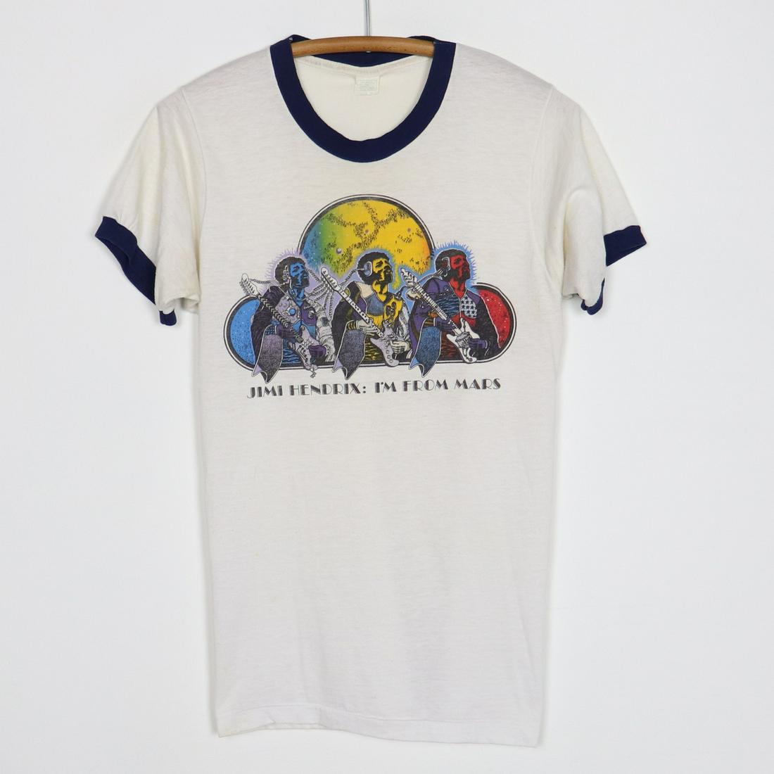 1970s Jimi Hendrix I'm From Mars Shirt: 1970s Jimi Hendrix I'm From Mars Shirt Original 1970s Jimi Hendrix I'm From Mars Shirt. This is a true vintage shirt not a modern reproduction. Sizes vary so please use measurements for best idea on f