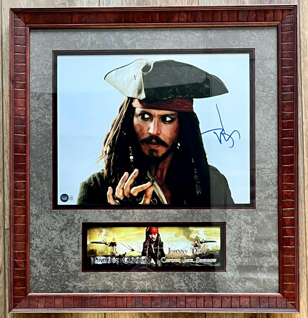 JOHNNY DEPP (Pirates of the Caribbean) signed 11x14 framed display-BAS BH080431: JOHNNY DEPP (Pirates of the Caribbean) signed 11x14 framed display-BAS BH080431 Industry: Movies Movie: Pirates of the Caribbean Signed By: Johnny Depp Size: 11x14 Signed: Yes Autograph Authentication