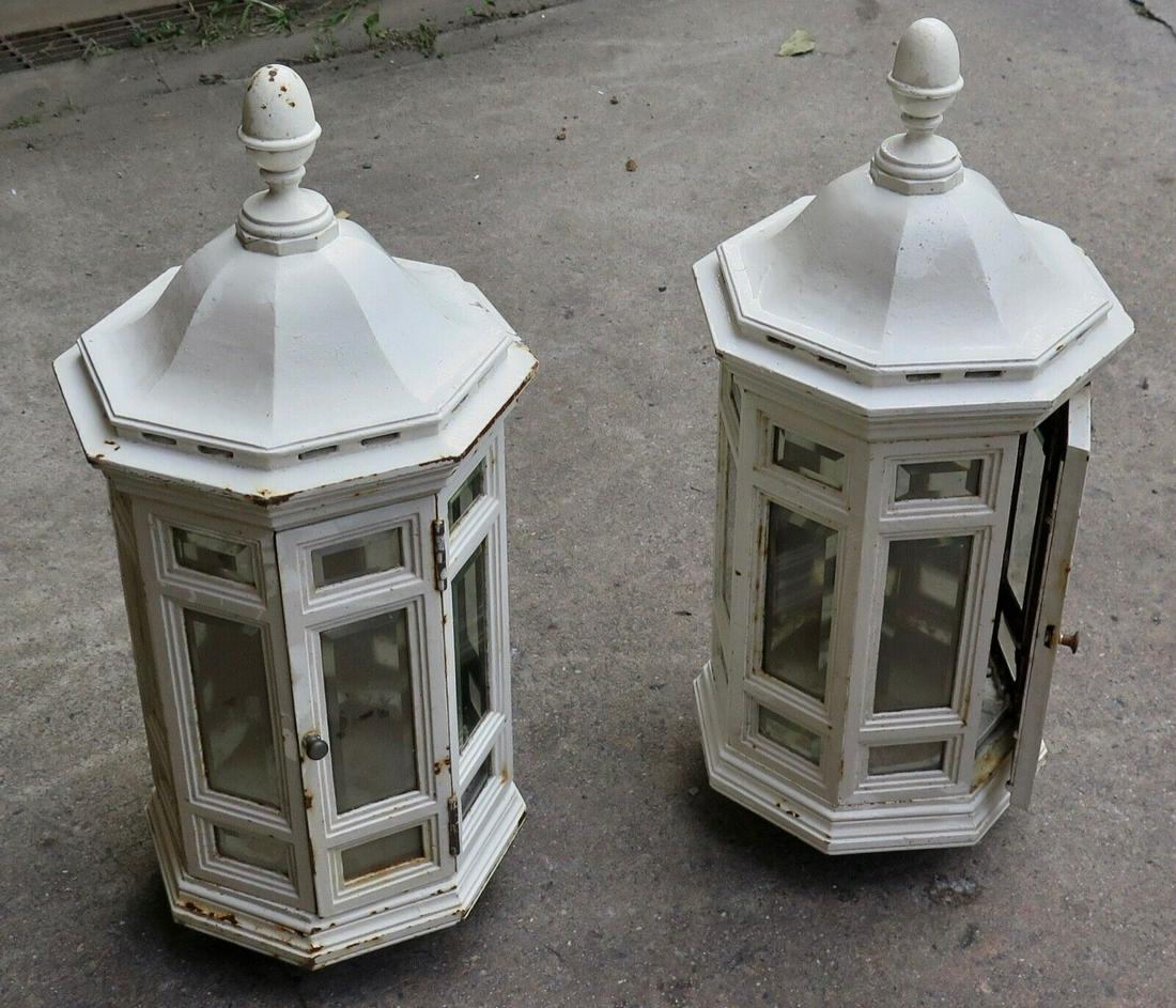 Vintage Early 20th Century Architectural Cast Iron Lanterns: Vintage Early 20th Century Architectural Cast Iron Lanterns Decade: 1900s Maker: Unknown Material: Cast Iron Original/Reproduction: Antique Original Color: White This vintage pair of architectural cas
