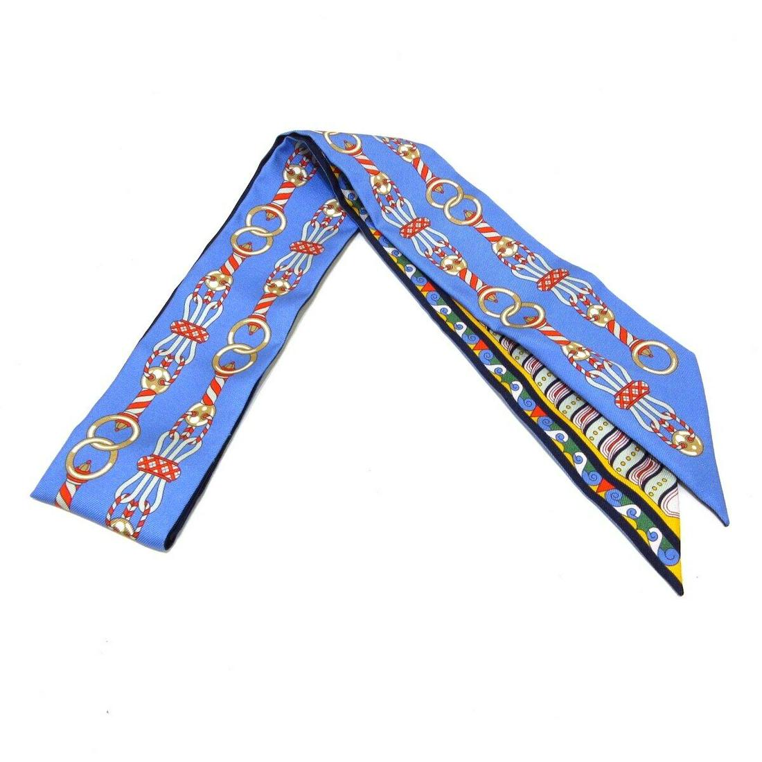 HERMES Twilly - Blue Multi Scarf: HERMES Twilly - Blue Multi Scarf Style: Scarf Color: Blue Multi Product Name: Twilly Accessories: Paper Tag Type: Scarf B: Reasonable Wear and Tear The Mynt Guarantee: All items in this auction are gu