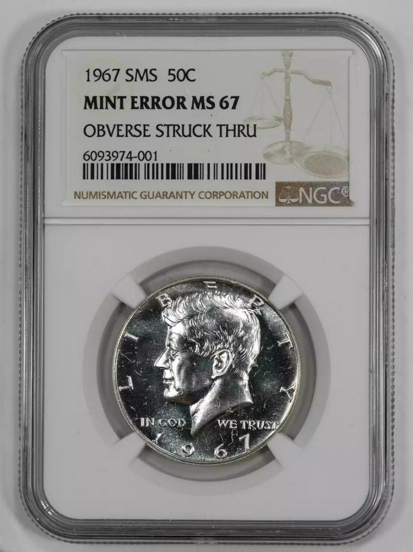 1967 SMS KENNEDY HALF DOLLAR 50C NGC MS 67 UNC MINT ERROR STRUCK THRU (001): 1967 SMS KENNEDY HALF DOLLAR 50C NGC MS 67 UNC MINT ERROR STRUCK THRU (001) Certification: NGC Composition: Silver Grade: MS-67 Year: 1967 Circulated/Uncirculated: Uncirculated Strike Type: MS Mint Lo