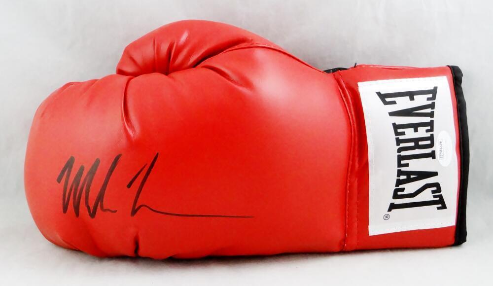 Mike Tyson Autographed Red Everlast Boxing Glove- JSA W *left: Mike Tyson Autographed Red Everlast Boxing Glove- JSA W *left Sport: Boxing Original/Reprint: Original Autograph Authentication: James Spence (JSA) Pre-Owned PLEASE NOTE: Framed Large or heavy Items d