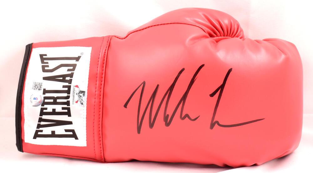 Mike Tyson Autographed Red Everlast Boxing Glove- Beckett W Hologram *Right: Mike Tyson Autographed Red Everlast Boxing Glove- Beckett W Hologram *Right Sport: Boxing Product: Glove Original/Reprint: Original Player: Mike Tyson Autograph Authentication: Beckett Authentication