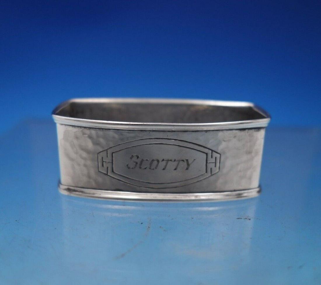 Webster Sterling Silver Napkin Ring Hammered "Scotty" 2 1/8" x 1" x 3/4": Webster Sterling Silver Napkin Ring Hammered " Scotty" 2 1/8" x 1" x 3/4" Websterfabulous webster sterling silver hammered napkin ring. This piece measures 2 1/8" x 1" x 3/4" . It is monogrammed " sco