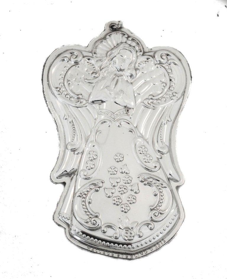 Sterling Christmas Angel Ornament: Sterling Christmas Angel Ornament Creator: Wallace Silversmiths (Manufacturer) Dimensions: Height: 4 in (10.16 cm)Diameter: 2.5 in (6.35 cm) Materials and Techniques: Sterling Silver Place of Origin: