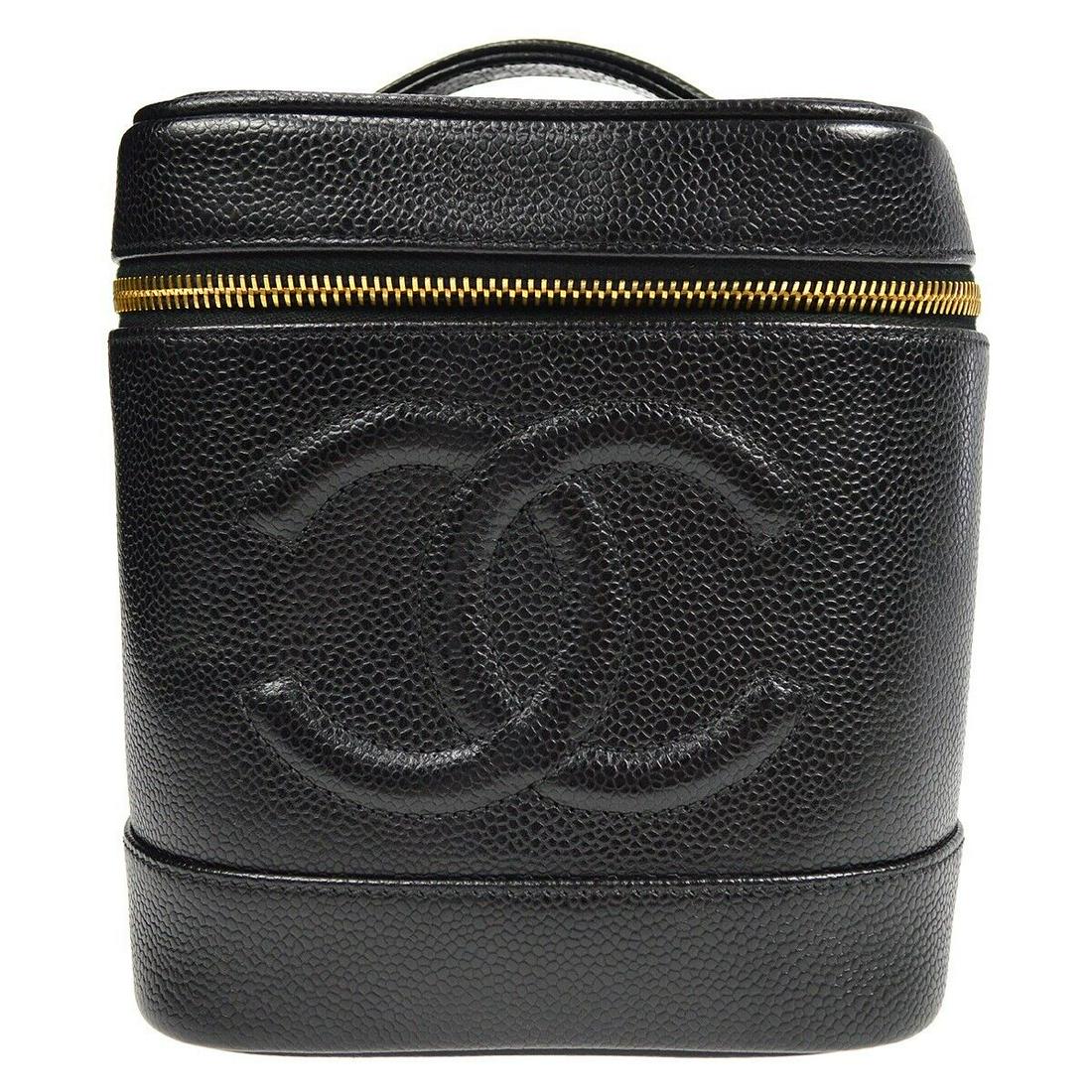 CHANEL CC Cosmetic Vanity Handbag Purse Black Caviar Skin 6121452: CHANEL CC Cosmetic Vanity Handbag Purse Black Caviar Skin 6121452 Bag Width: 5.9 Bag Height: 7.1 Closure: Zipper Occasion: Casual Size: Medium Lining Material: Leather Bag Depth: 5.1 Exterior Material
