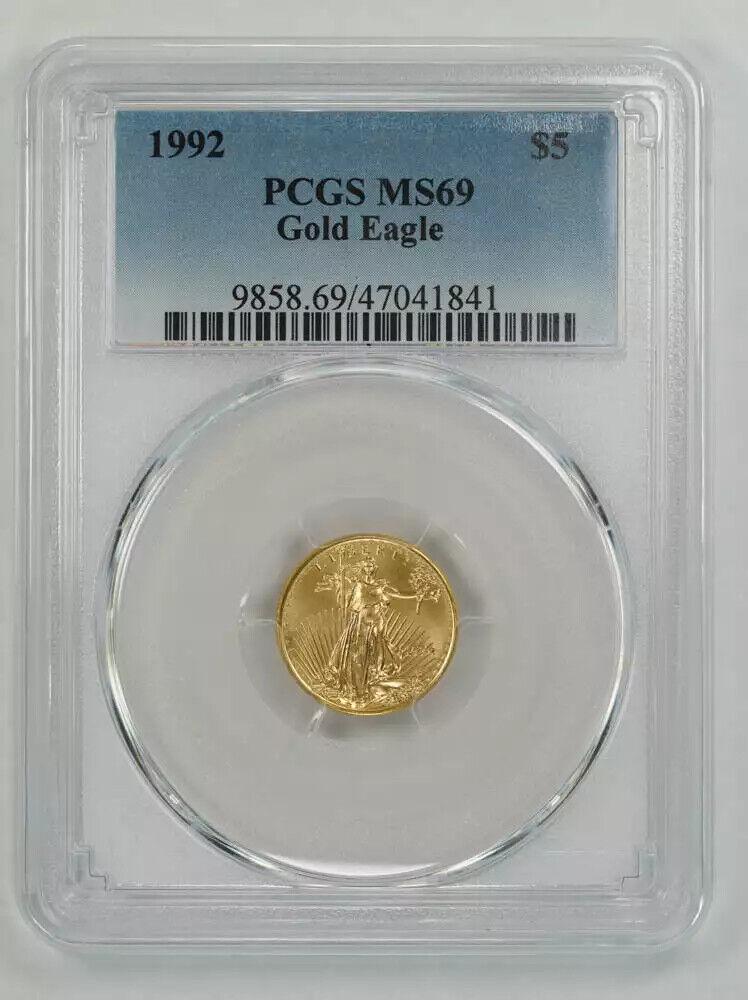 1992 AMERICAN GOLD EAGLE $5 PCGS MS 69 MINT STATE UNC 1/10 OZ 999 FINE GOLD (841: 1992 AMERICAN GOLD EAGLE $5 PCGS MS 69 MINT STATE UNC 1/10 OZ 999 FINE GOLD (841 Certification: PCGS Composition: Gold Grade: MS 69 Year: 1992 Circulated/Uncirculated: Uncirculated Mint Location: PHIL