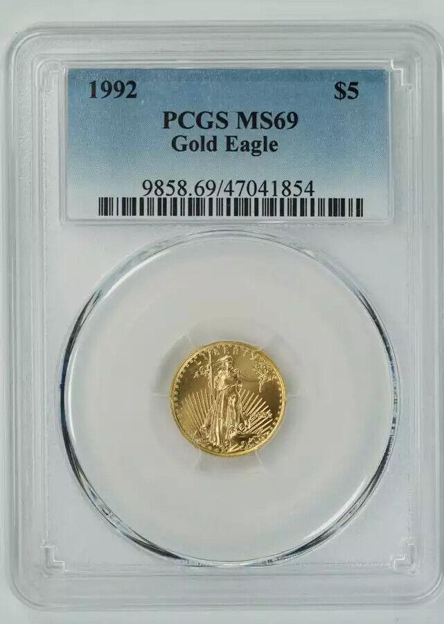 1992 AMERICAN GOLD EAGLE $5 PCGS MS 69 MINT STATE UNC 1/10 OZ 999 FINE GOLD (854: 1992 AMERICAN GOLD EAGLE $5 PCGS MS 69 MINT STATE UNC 1/10 OZ 999 FINE GOLD (854 Certification: PCGS Composition: Gold Grade: MS-69 Year: 1992 Circulated/Uncirculated: Uncirculated Strike Type: MS Min