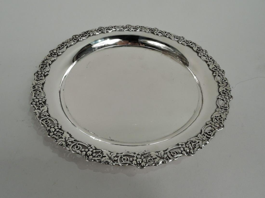 Dominick & Haff Coaster 250 Antique Wine Bottle American Sterling Silver 1895: Dominick & Haff Coaster 250 Antique Wine Bottle American Sterling Silver 1895 Pattern: 250 Type: Wine Bottle Coaster Style: Victorian Age: 1850-1899 Victorian sterling silver wine bottle coaster. Made