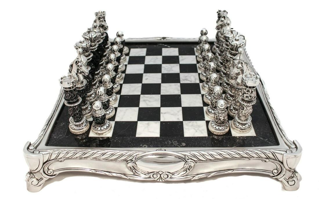 FINE HANDCRAFTED DETAILED RARE ITALIAN SILVER PLATE & MARBLE CHESS SET: FINE HANDCRAFTED DETAILED RARE ITALIAN SILVER PLATE & MARBLE CHESS SET This rare & magnificent fine Italian silver plated & Marble Chess Set is weighted with resin. Features rich handcrafted detailed 