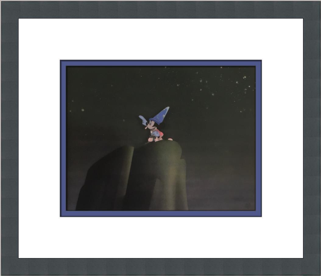 Walt Disney Mickey Mouse Fantasia Custom Framed Print: Walt Disney Mickey Mouse Fantasia Custom Framed Print Size: Medium Region Of Origin: united states Artist: Walt Disney Production Technique: Lithography Framing: Matted & Framed Style: Cartoon Realism