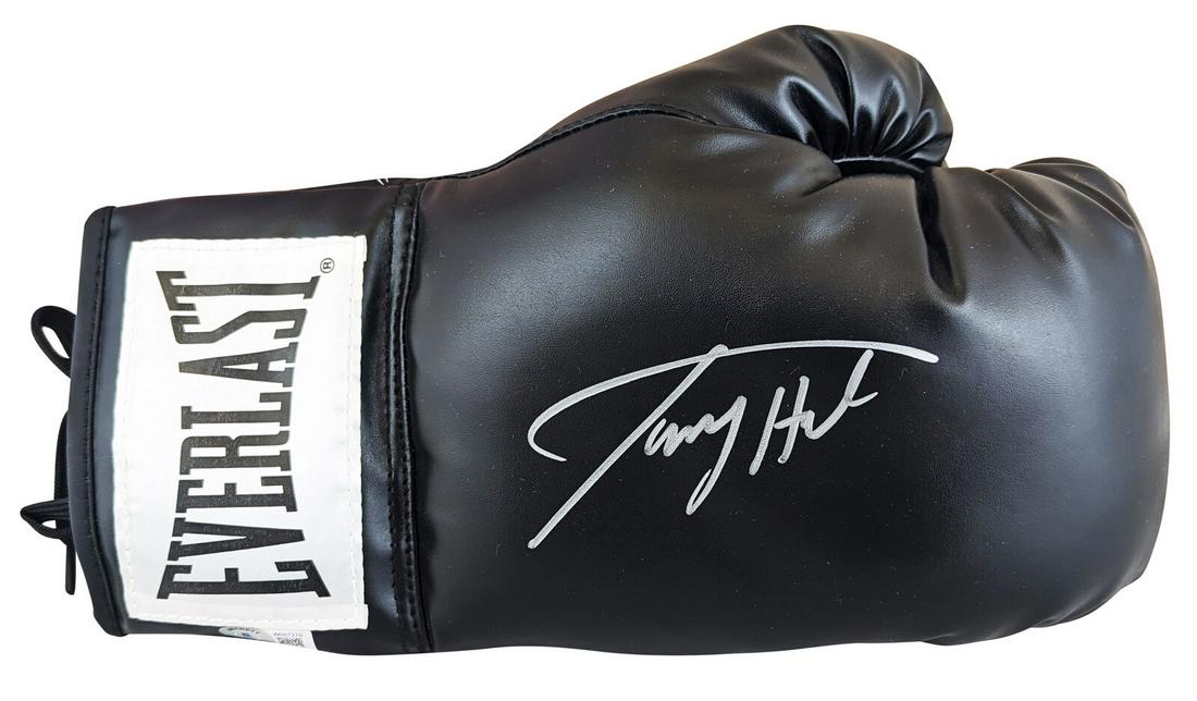 Larry Holmes Signed Black Everlast Boxing Glove BAS Witnessed: Larry Holmes Signed Black Everlast Boxing Glove BAS Witnessed Sport: Boxing Product: Glove Original/Reprint: Original Player: Larry Holmes Autograph Authentication: Beckett Product Coa: Beckett Produc
