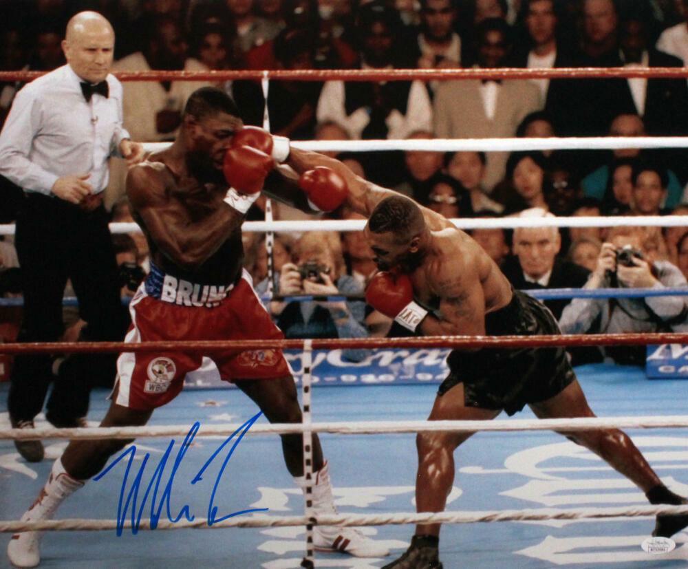 Mike Tyson Autographed 16x20 Landing Punch Photo- JSA W *Left: Mike Tyson Autographed 16x20 Landing Punch Photo- JSA W *Left Sport: Boxing Product: Photo Original/Reprint: Original Player: Mike Tyson Autograph Authentication: James Spence (JSA) Pre-Owned PLEASE N