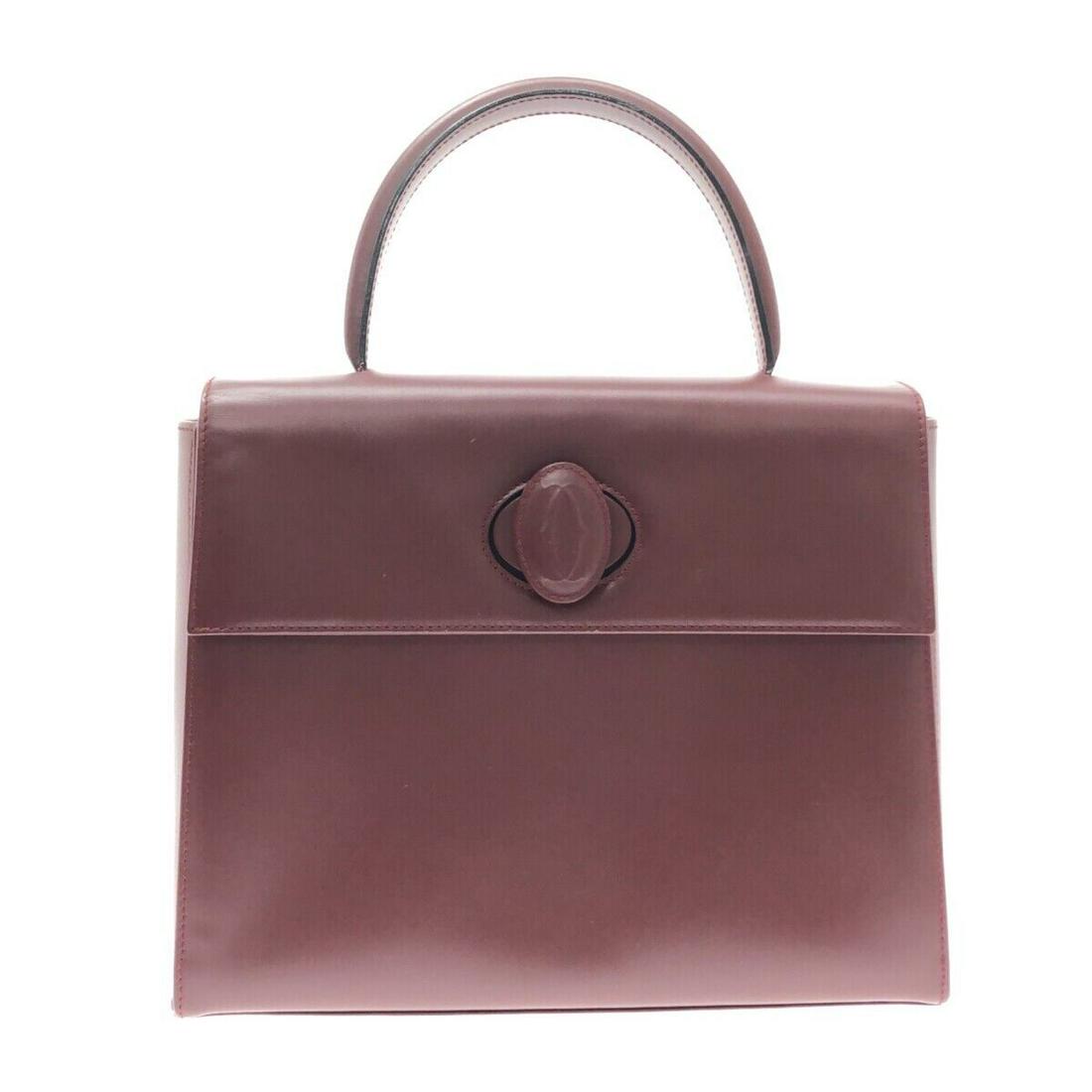 Cartier Must Line L1000134 Bordeaux Leather Handbag: Cartier Must Line L1000134 Bordeaux Leather Handbag Style: Handbag Exterior Color: Bordeaux Exterior Material: Leather Product Name: Must Line Accessories: Dust Bag Guarantee Type: Handbag B: Reasonab