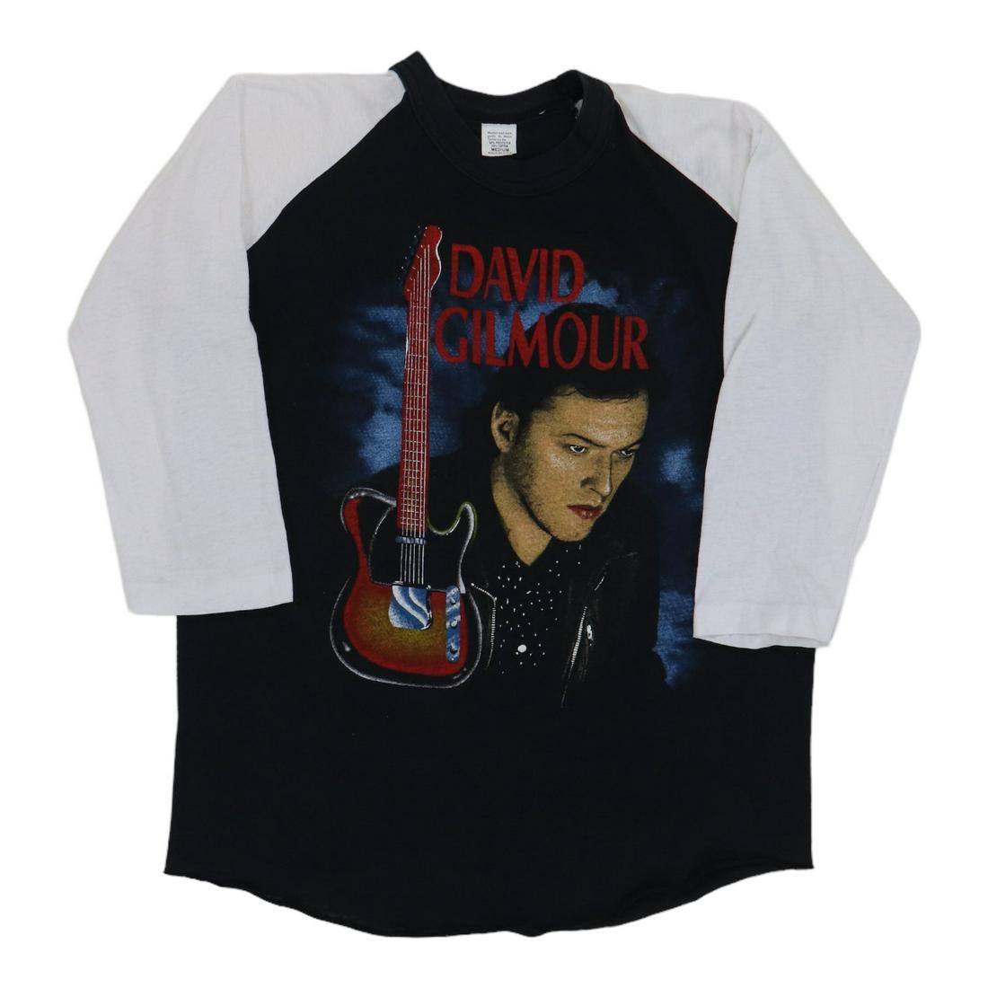 1984 David Gilmour Tour Jersey Shirt: 1984 David Gilmour Tour Jersey Shirt Original 1984 David Gilmour Tour Jersey Shirt. This is a true vintage shirt, not a modern reproduction. Sizes vary so please use measurements for best idea on fit.