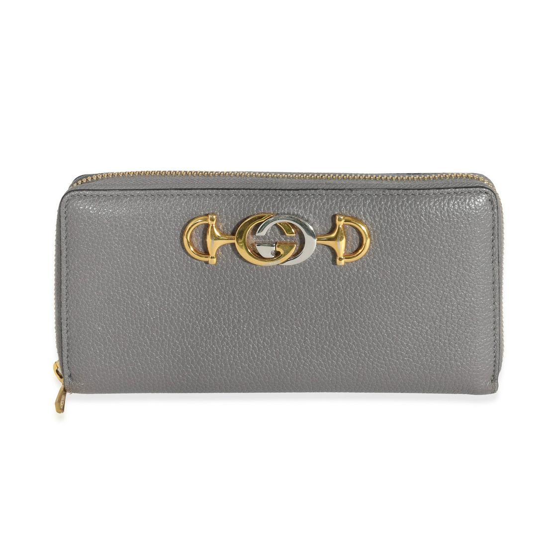 Gucci Grey Grainy Calfskin Zumi Zip Around Continental Wallet: Gucci Grey Grainy Calfskin Zumi Zip Around Continental Wallet Gender: Unisex Dimensions: 7.5 x 4 x 1 Bag Depth: 1 Handbag Accessories: Box;Dustbag;Care Booklet Style: Wallet Material: Leather Color: G