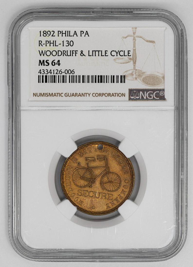 1892 WOODRUFF & LITTLE CYCLE TOKEN PHILADELPHIA NGC MS 64 MINT STATE UNC (006): 1892 WOODRUFF & LITTLE CYCLE TOKEN PHILADELPHIA NGC MS 64 MINT STATE UNC (006) Certification Number: 4334126-006Certification: NGCGrade: MS 64Year: 1892Circulated/Uncirculated: UncirculatedPre-Owned T
