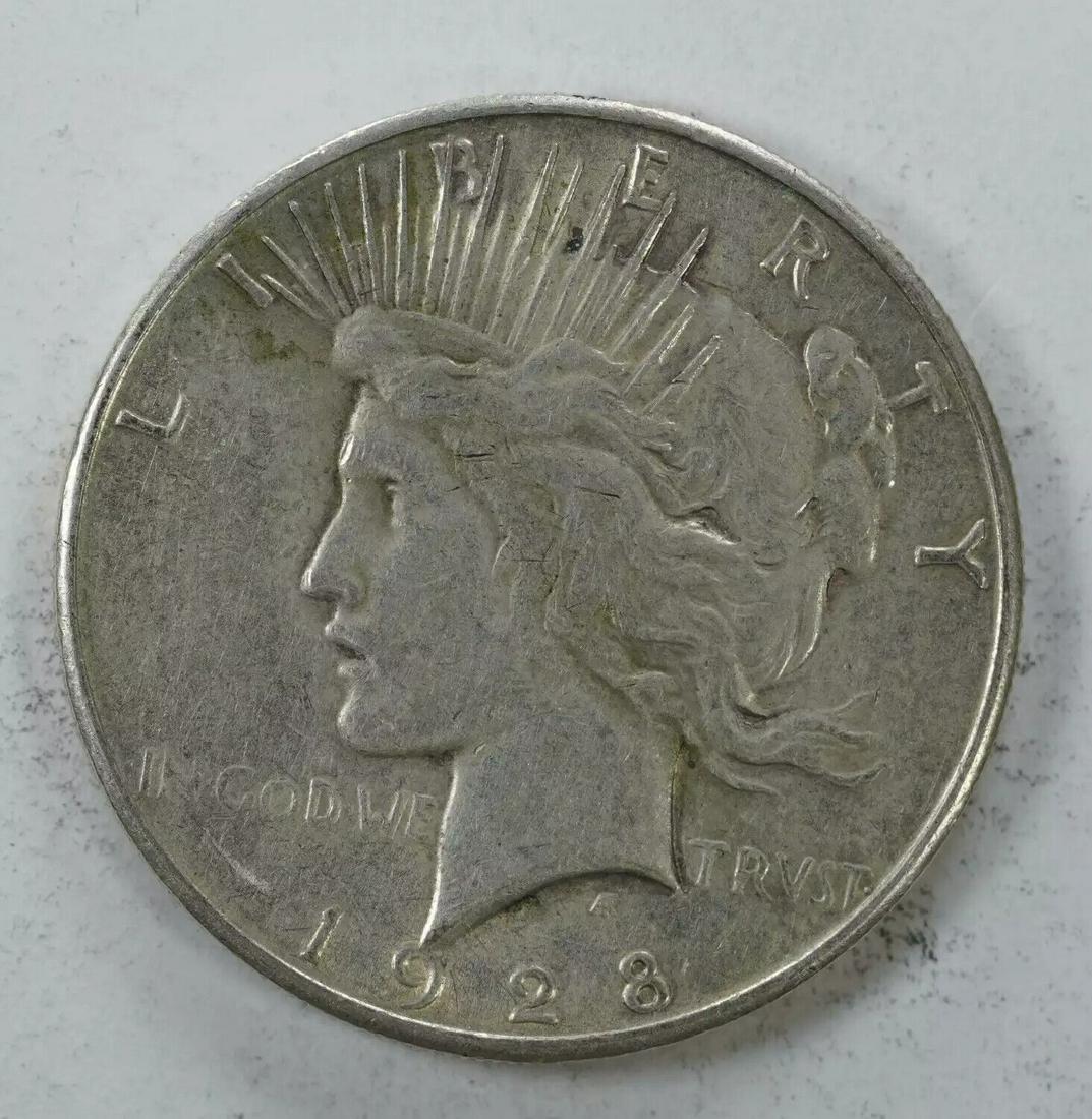 1928 S PEACE SILVER DOLLAR $1 XF EXTRA FINE / AU ABOUT UNCIRCULATED (6064): 1928 S PEACE SILVER DOLLAR $1 XF EXTRA FINE / AU ABOUT UNCIRCULATED (6064) Certification: Uncertified Composition: Silver Year: 1928 Circulated/Uncirculated: Unknown Strike Type: No Grade Mint Locatio