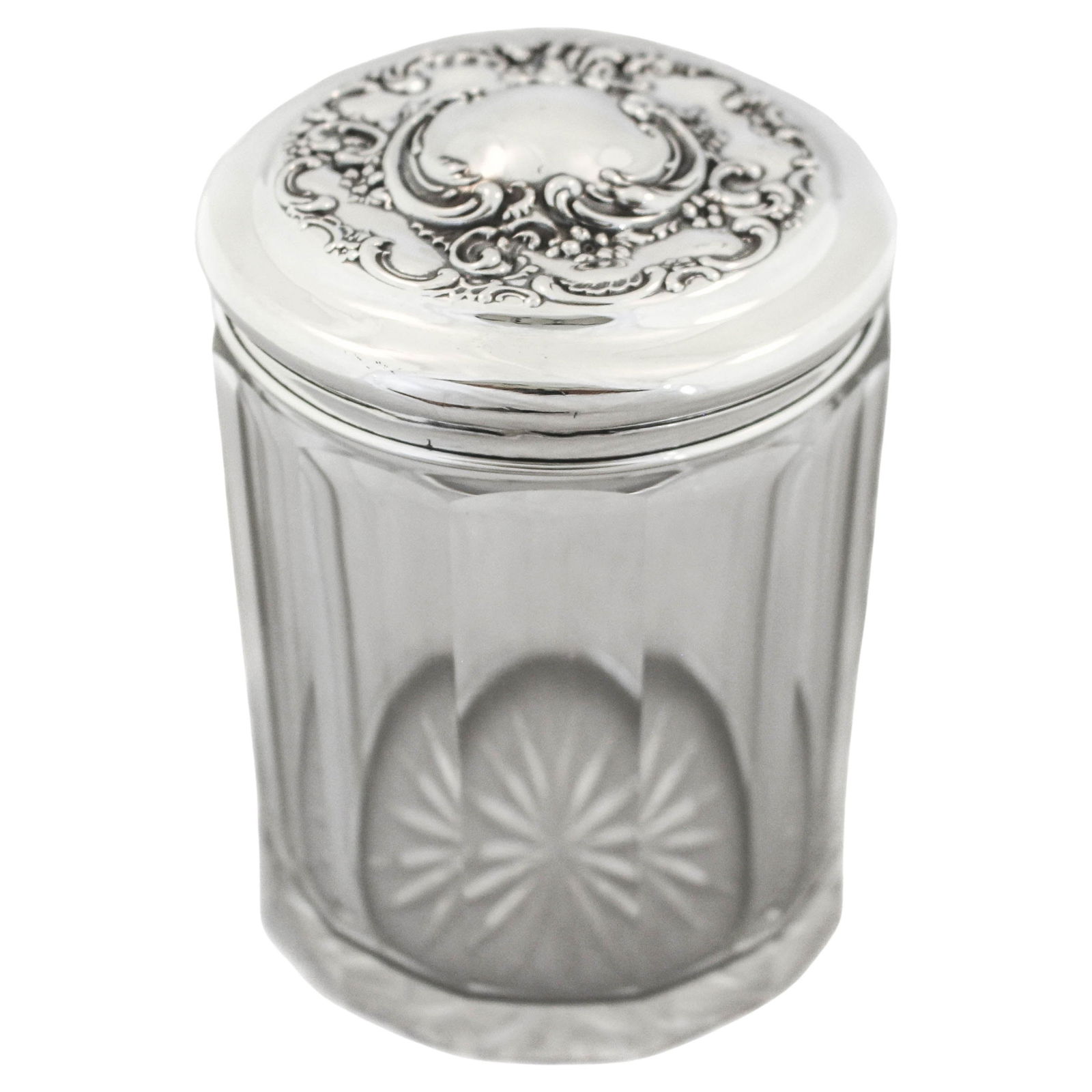 Sterling and Crystal Vanity Jar: Sterling and Crystal Vanity Jar Creator: Wallace Silversmiths (Manufacturer) Dimensions: Height: 5 in (12.7 cm)Diameter: 4 in (10.16 cm) Materials and Techniques: Crystal Sterling Silver Place of Orig