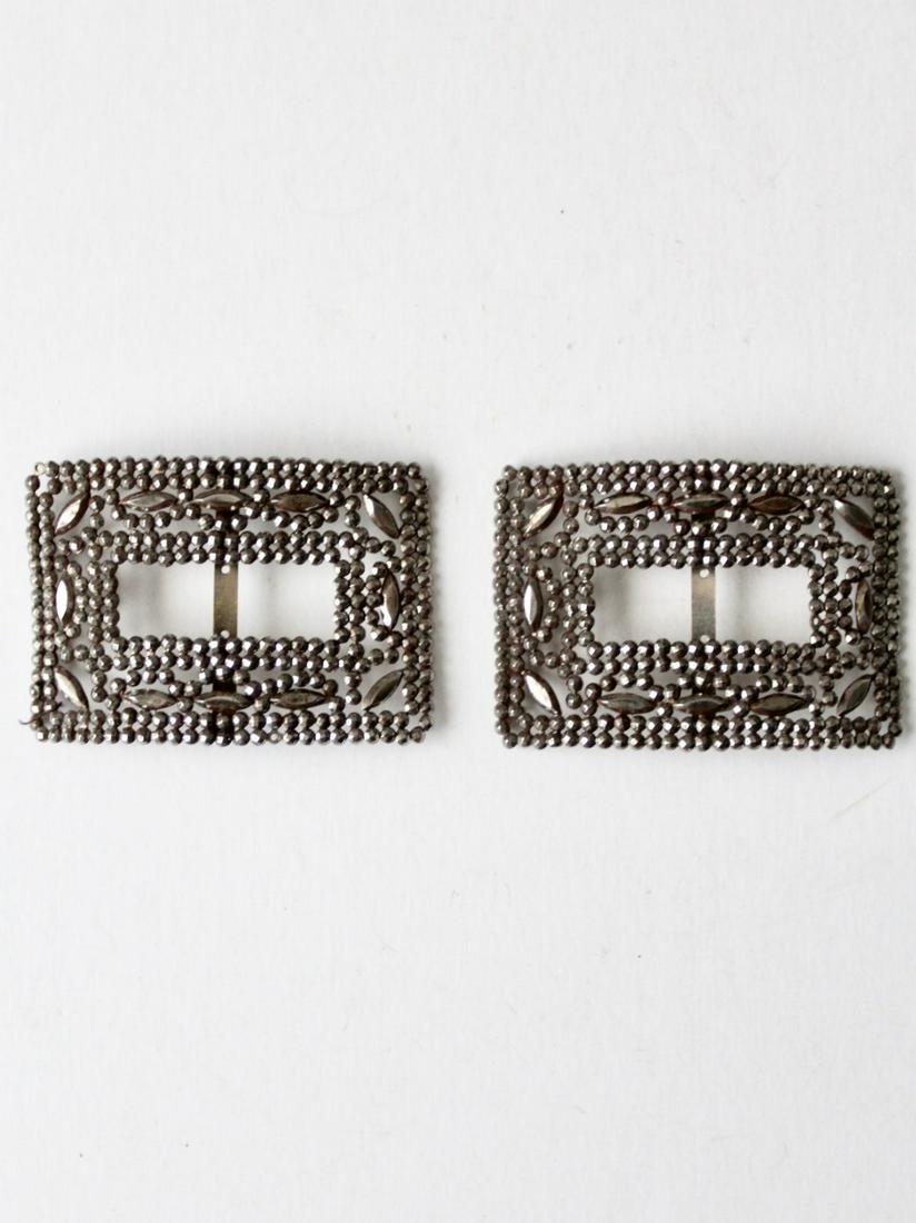 Antique French Shoe Buckles: Antique French Shoe Buckles This is a pair of late 19th century French steel cut shoe buckles. Faceted cut steel shimmers like diamonds in a dramatic art nouveau rectangular design. Worn as shoe buckl