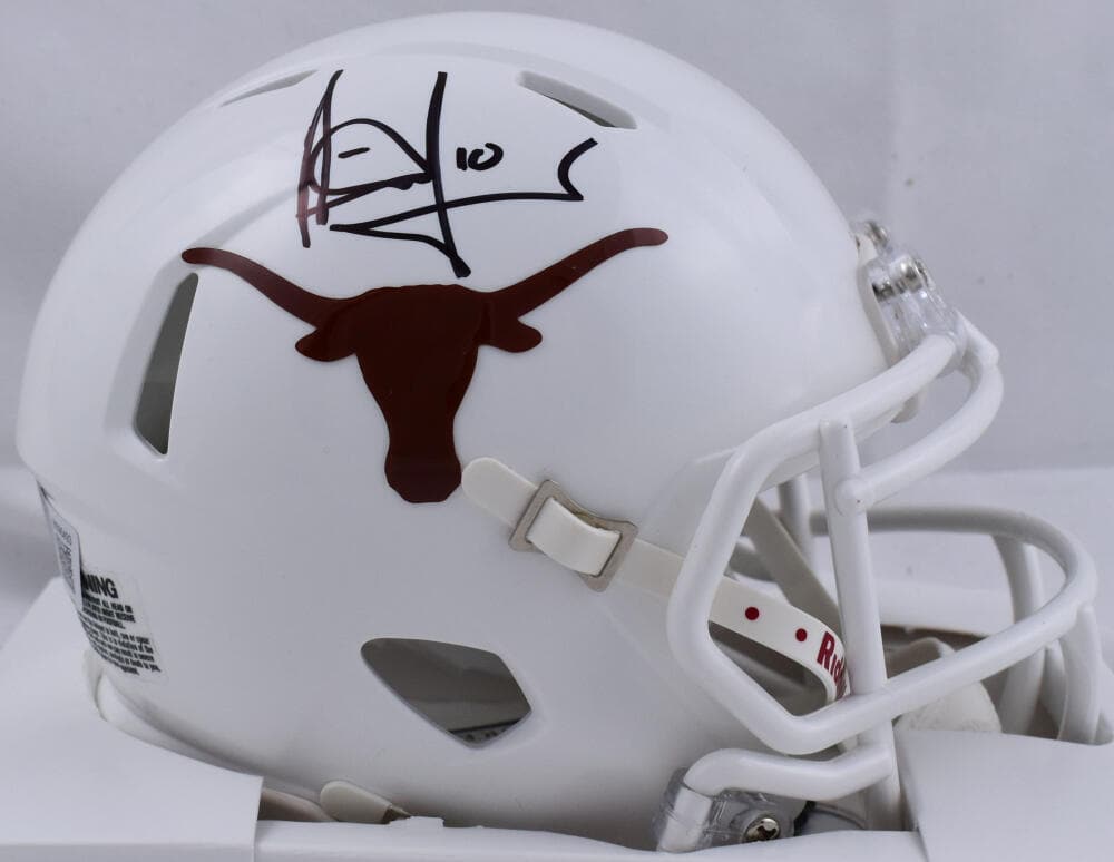Vince Young Autographed Texas Longhorns Speed Mini Helmet - Beckett W Hologram: Vince Young Autographed Texas Longhorns Speed Mini Helmet - Beckett W Hologram Sport: Football Product: Helmet Original/Reprint: Original Team: Texas Longhorns Player: Vince Young Autograph Authentica