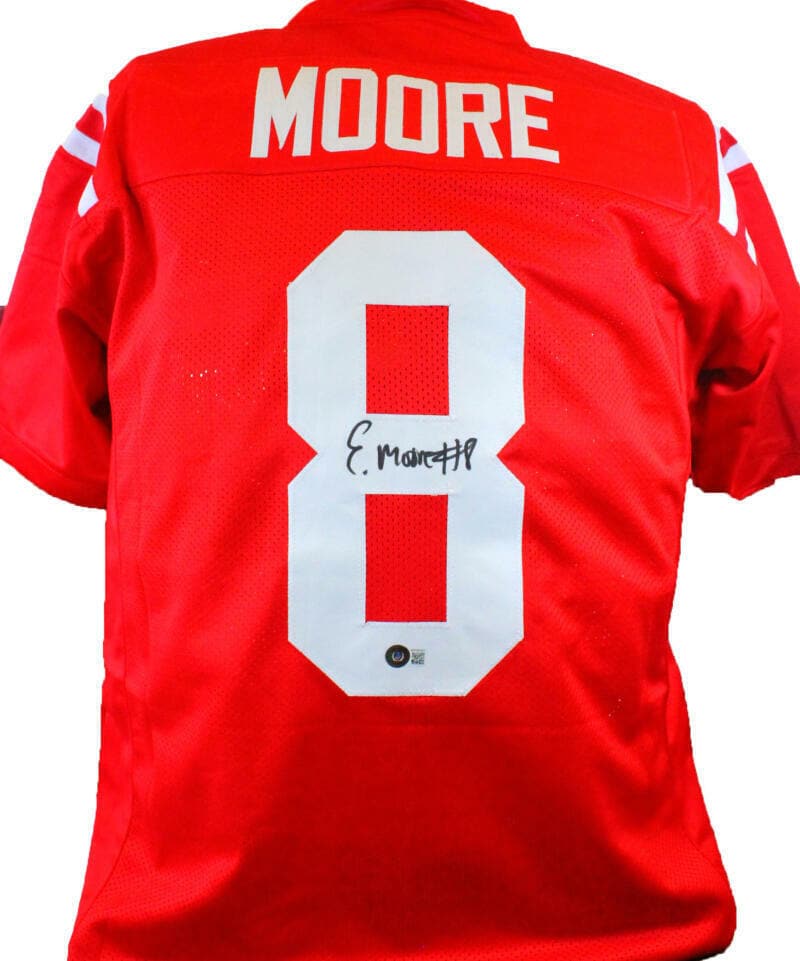 Elijah Moore Autographed Red College Style Jersey - Beckett W Hologram *Black: Elijah Moore Autographed Red College Style Jersey - Beckett W Hologram *Black Sport: Football Product: Jersey Original/Reprint: Original Team: Ole Miss Rebels Player: Elijah Moore Autograph Authentica