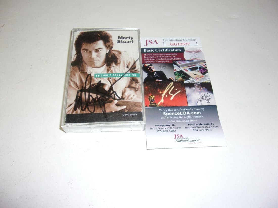 MARTY STUART THIS ONES GONNA HURT YOU JSA/COA SIGNED CASSETTE TAPE ALBUM: MARTY STUART THIS ONES GONNA HURT YOU JSA/COA SIGNED CASSETTE TAPE ALBUM Original/Reproduction: Original Object Type: CD & Booklet Industry: Music Pre-Owned The MYNT Guarantee: All items in this aucti