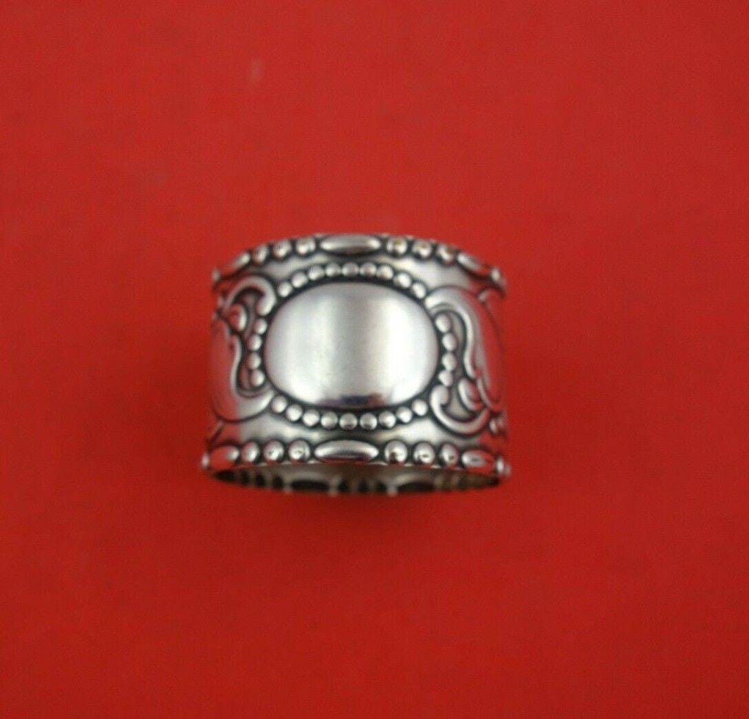 Arts and Crafts by TB Danish .830 Silver Napkin Ring 1 3/4" x 1 1/4" 1.1 ozt.: Arts and Crafts by TB Danish .830 Silver Napkin Ring 1 3/4" x 1 1/4" 1.1 ozt. Arts and crafts by tbarts and crafts. 830 silver napkin ring 1 3/4" x 1 1/4" by tb of denmark. This piece weighs 1. 1 troy