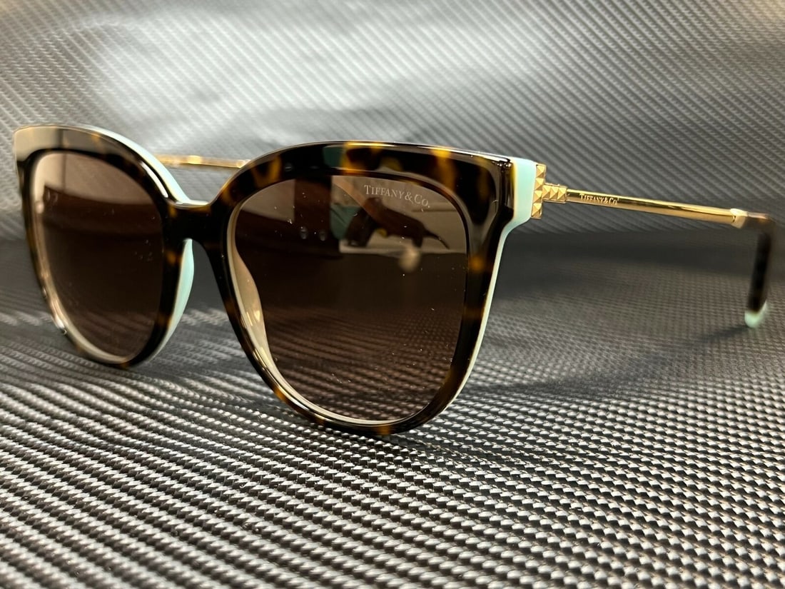 TIFFANY TF4176 81343B Havana Cat Eye Womens 55 mm Sunglasses: TIFFANY TF4176 81343B Havana Cat Eye Womens 55 mm Sunglasses Type: Sunglasses Frame Color: Beige Style: Cat Eye New The Mynt Guarantee: All items in this auction are guaranteed to be 100% authentic. A