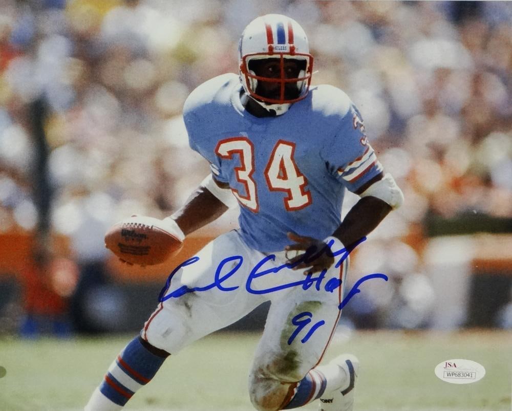 Earl Campbell Signed Oilers 8x10 Photo Running With Ball W/HOF- JSA W *Blue: Earl Campbell Signed Oilers 8x10 Photo Running With Ball W/HOF- JSA W *Blue Autograph Authentication: James Spence (JSA)/ Player: Earl Campbell Team: Houston Oilers Original/Reprint: Original Sport: F