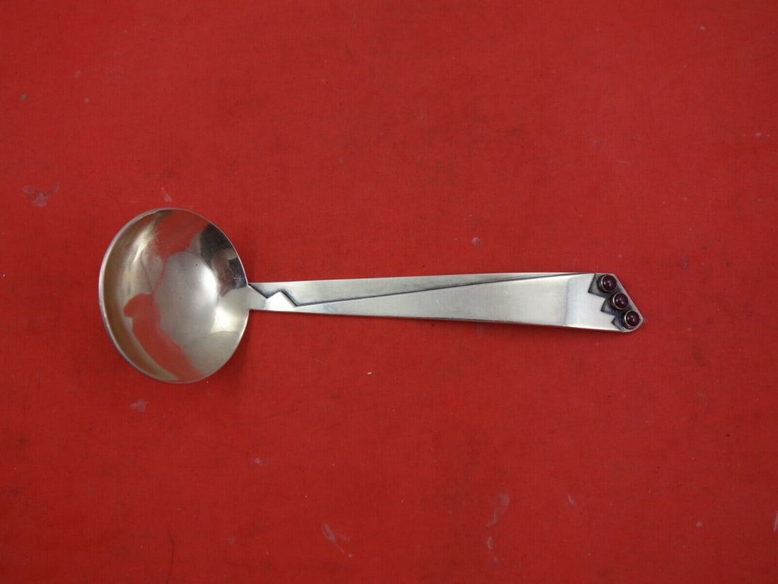 Indigenous Sterling Silver Gravy Ladle Hand Wrought Applied Garnet Cabochons: Indigenous Sterling Silver Gravy Ladle Hand Wrought Applied Garnet Cabochons Native americannative american sterling silver gravy ladle, hand wrought with applied garnet cabochons, 6 3/8". It is not m