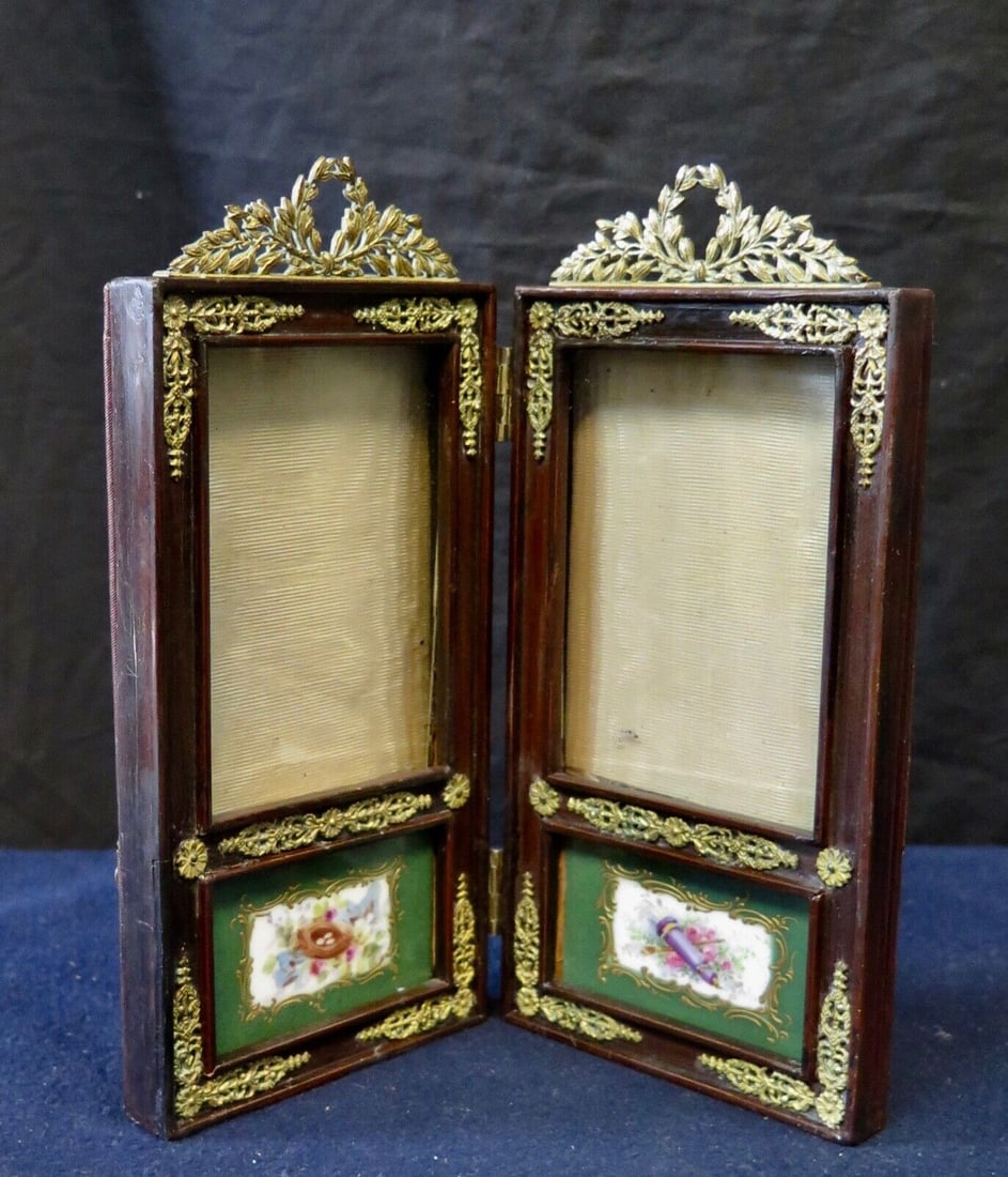 Unique Vintage Continental "Double" Photo Frame: Unique Vintage Continental "Double" Photo Frame Item Width: 13 in Primary Material: Wood Item Length: 2 in Item Height: 7 in Age: 1900-1940 Style: Victorian Color: Brown Type: Picture Frames Original/