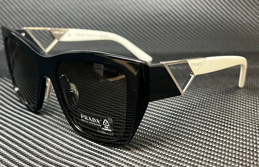 PRADA PR 21YS 1AB5S0 Black White Womens 54 mm Sunglasses: PRADA PR 21YS 1AB5S0 Black White Womens 54 mm Sunglasses Frame Color: Black Type: Sunglasses New The Mynt Guarantee: All items in this auction are guaranteed to be 100% authentic. At Your Service: At 