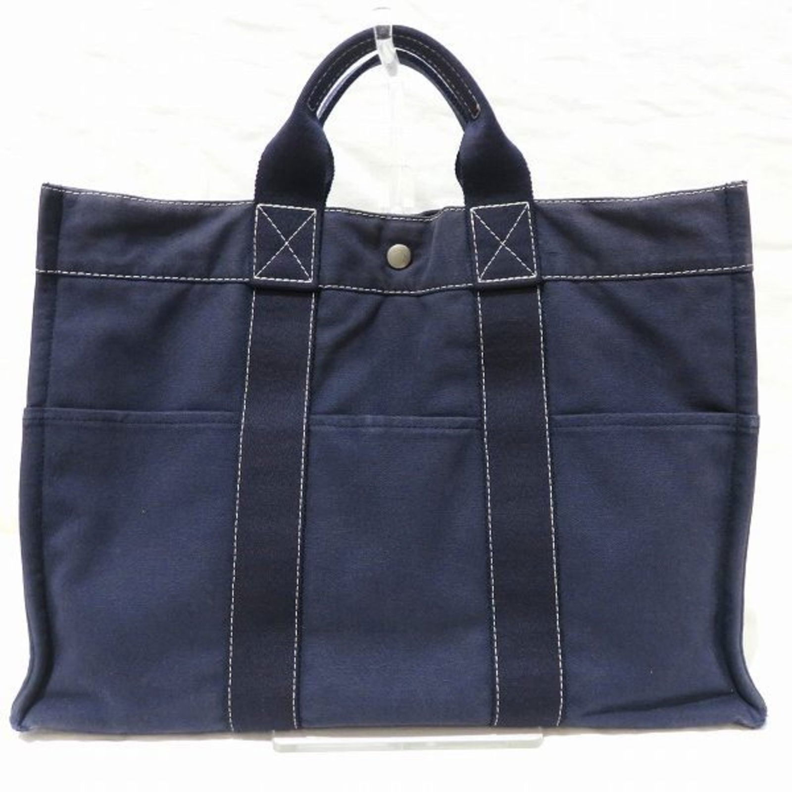 Hermes Sac Deauville MM Navy Bag Tote Unisex: Hermes Sac Deauville MM Navy Bag Tote Unisex Brand: Hermes Type: Tote bag Material: Cotton canvas Cotton canvas: Color: Navy White Inner Pocket: Zipper pocket1 Zipper pocket: 1 Outer Pocket: Open pock