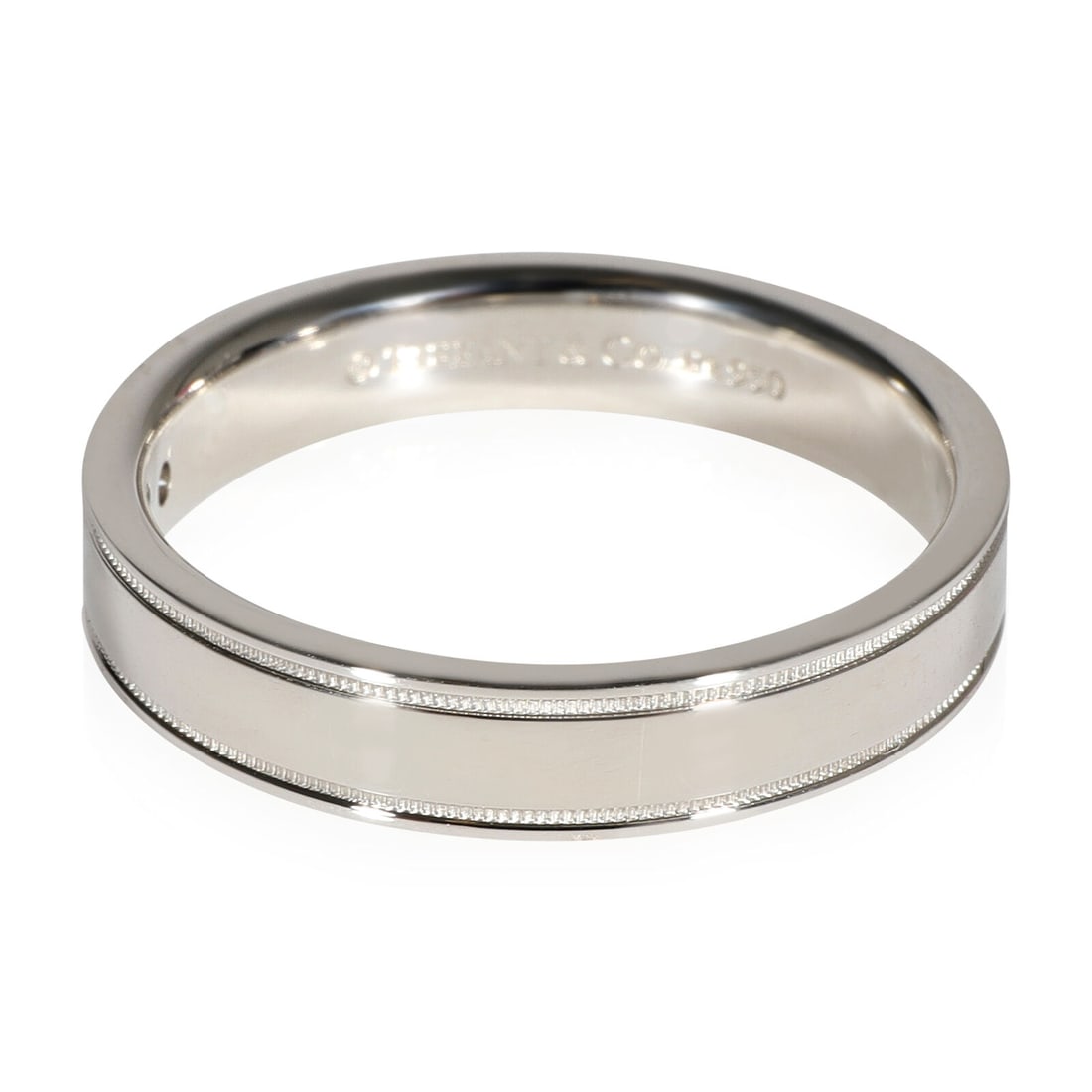 Tiffany & Co. Essentials Milgrain Diamond Wedding Band in Platinum 0.01 CTW: Tiffany & Co. Essentials Milgrain Diamond Wedding Band in Platinum 0.01 CTW Gender: Unisex Metal: Platinum Total Carat Weight: 0.01 Size: 7.5 Gross Weight (Grams): 6.66 With Original Box/Packaging: No