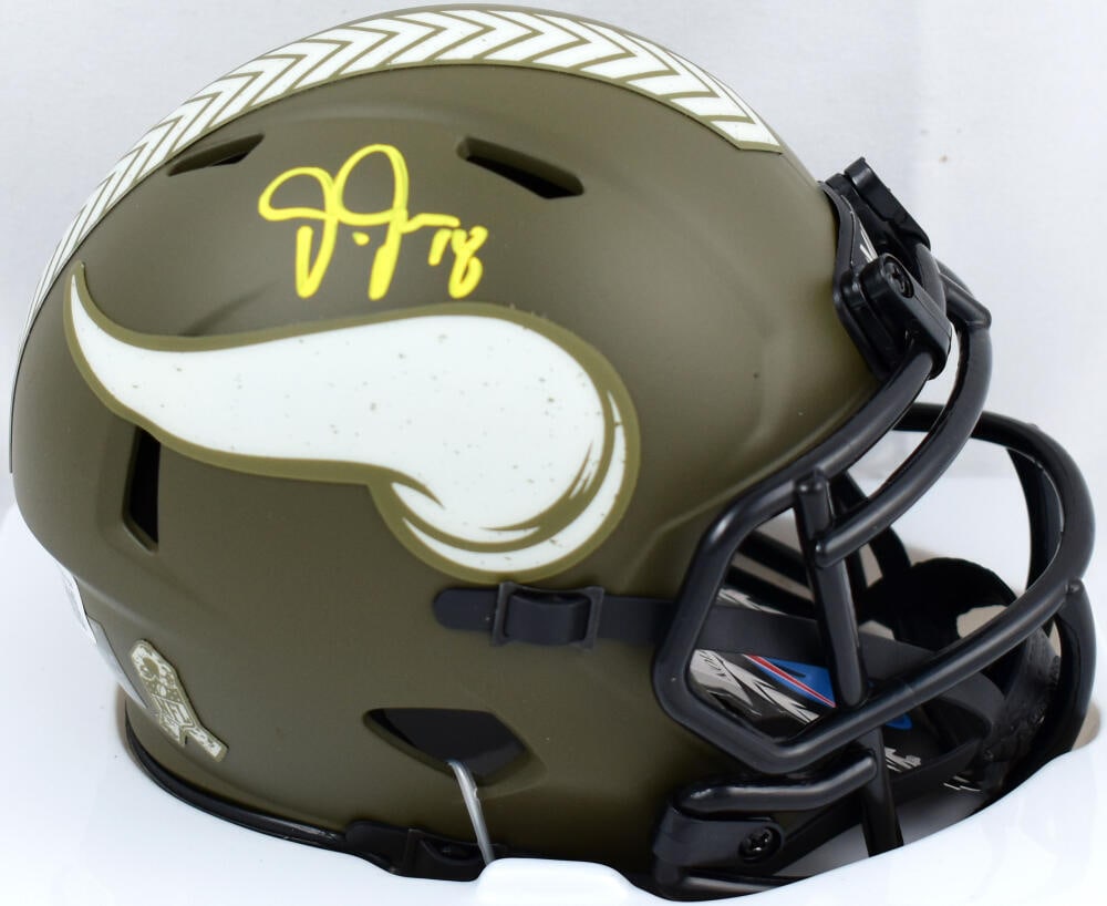 Justin Jefferson Signed Vikings Salute to Service Speed Mini Helmet-BeckettWHolo: Justin Jefferson Signed Vikings Salute to Service Speed Mini Helmet-BeckettWHolo Sport: Football Product: Helmet Original/Reprint: Original Player: Justin Jefferson Team: Minnesota Vikings Autograph A