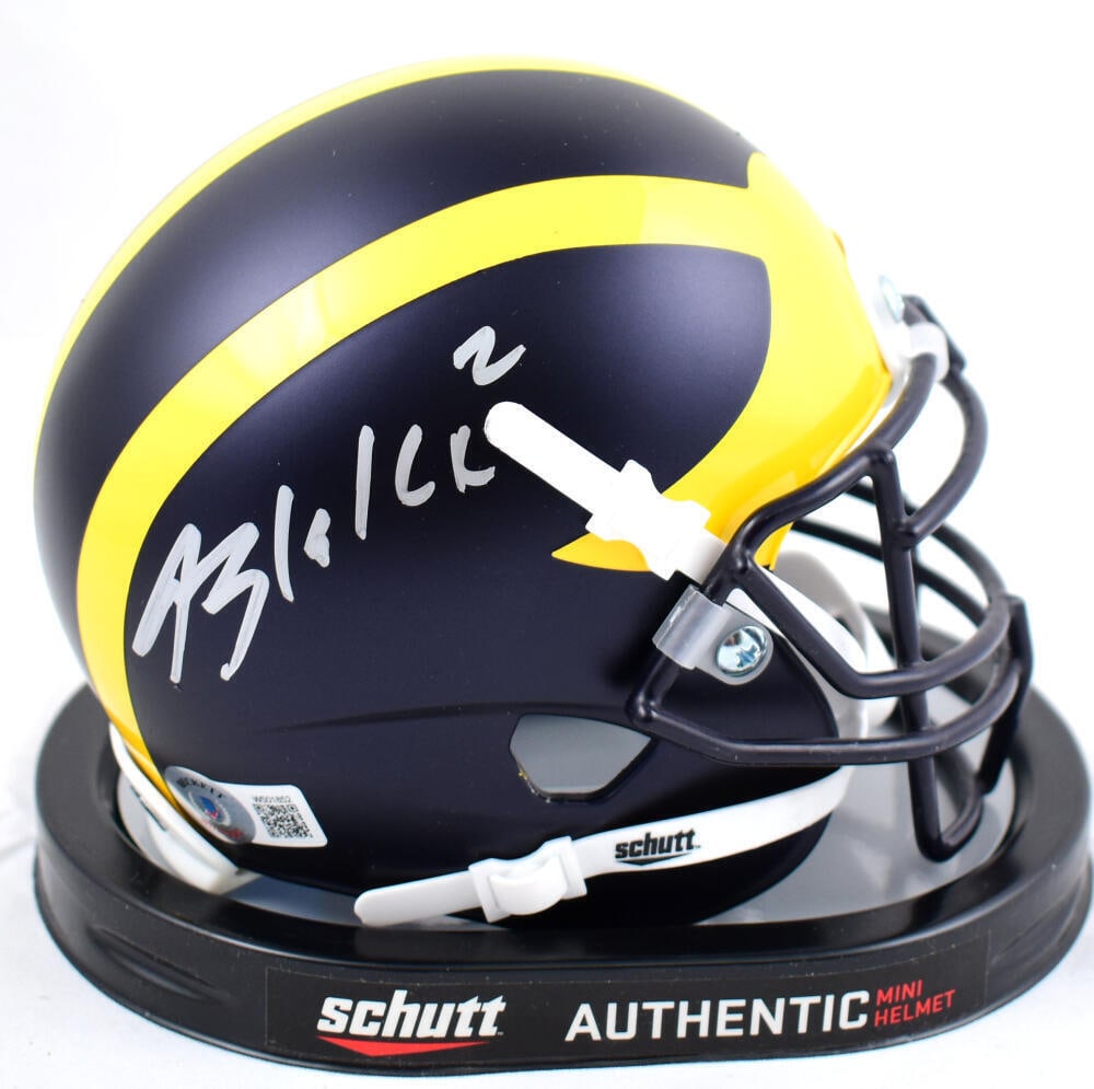 Blake Corum Autographed Michigan Wolverines Schutt Mini Helmet- Beckett W Holo: Blake Corum Autographed Michigan Wolverines Schutt Mini Helmet- Beckett W Holo Sport: Football Product: Helmet Original/Reprint: Original Team: Michigan Wolverines Autograph Authentication: Beckett Au