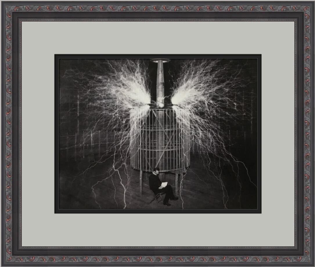 Nikola Tesla with Tesla Coil in NYC Custom Framed Print: Nikola Tesla with Tesla Coil in NYC Custom Framed Print Artist: unknown Unit Of Sale: Single Piece Size: Medium Item Length: 18 in Region Of Origin: united states Framing: Matted & Framed Personalize: