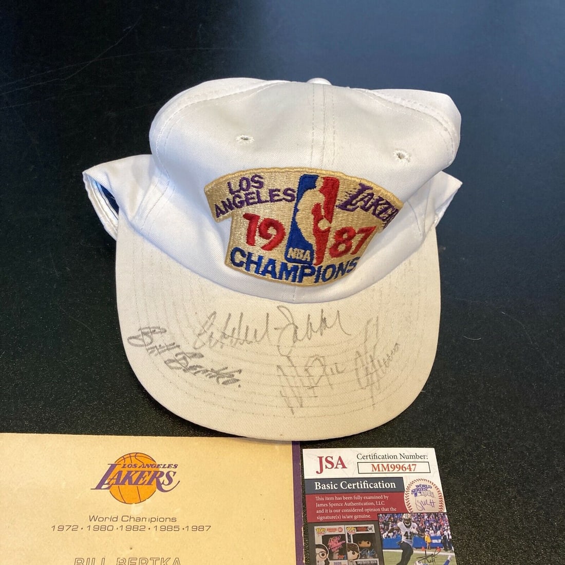 Magic Johnson Kareem Abdul Jabbar Signed 1987 Los Angeles Lakers Champs Cap JSA: Magic Johnson Kareem Abdul Jabbar Signed 1987 Los Angeles Lakers Champs Cap JSA Product: Ball Sport: Basketball-NBA Autograph Authentication: James Spence (JSA) Team: Los Angeles Lakers Original/Repri