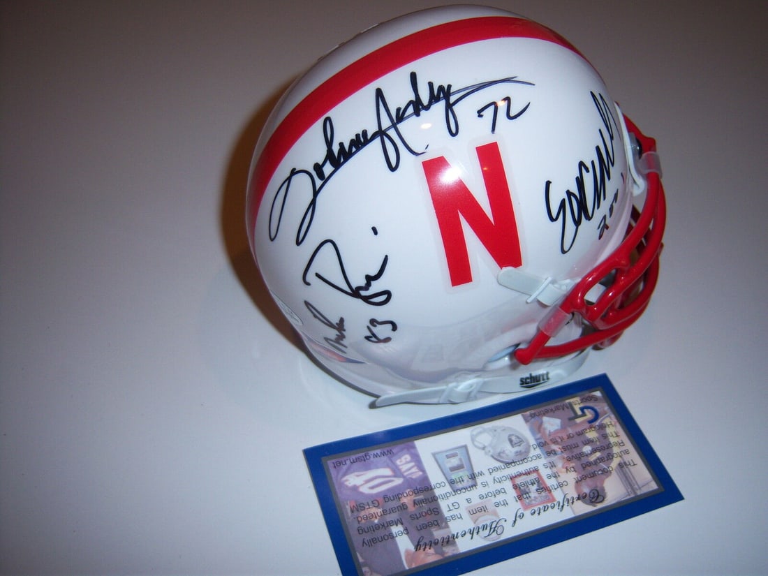 JOHNNY RODGERS MIKE ROZIER ERIC CROUCH NEBRASKA GTSM/COA SIGNED MINI HELMET: JOHNNY RODGERS MIKE ROZIER ERIC CROUCH NEBRASKA GTSM/COA SIGNED MINI HELMET Product: Helmet Autograph Type: Sports: Originals Team-College-Ncaa: Michigan Sport: College-NCAA Original/Reprint: Original