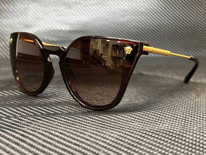 VERSACE VE4410 388 13 Transparent Red Cat Eye 60 mm Womens Sunglasses: VERSACE VE4410 388 13 Transparent Red Cat Eye 60 mm Womens Sunglasses Frame Color: Red Type: Sunglasses Uv Protection: UV 100% Lens Technology: Gradient Style: Cat Eye Frame Material: Plastic Metal Le