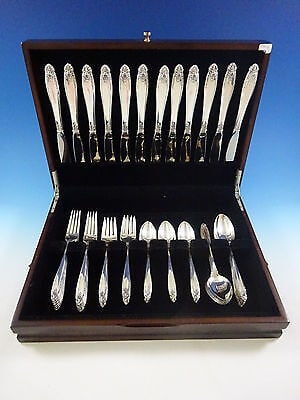 Prelude by International Sterling Silver Flatware Service For 12 Set 60 Pieces: Prelude by International Sterling Silver Flatware Service For 12 Set 60 Pieces Slender and graceful, the smooth clean lines of this refined pattern are distinguished with deeply carved floral ornament
